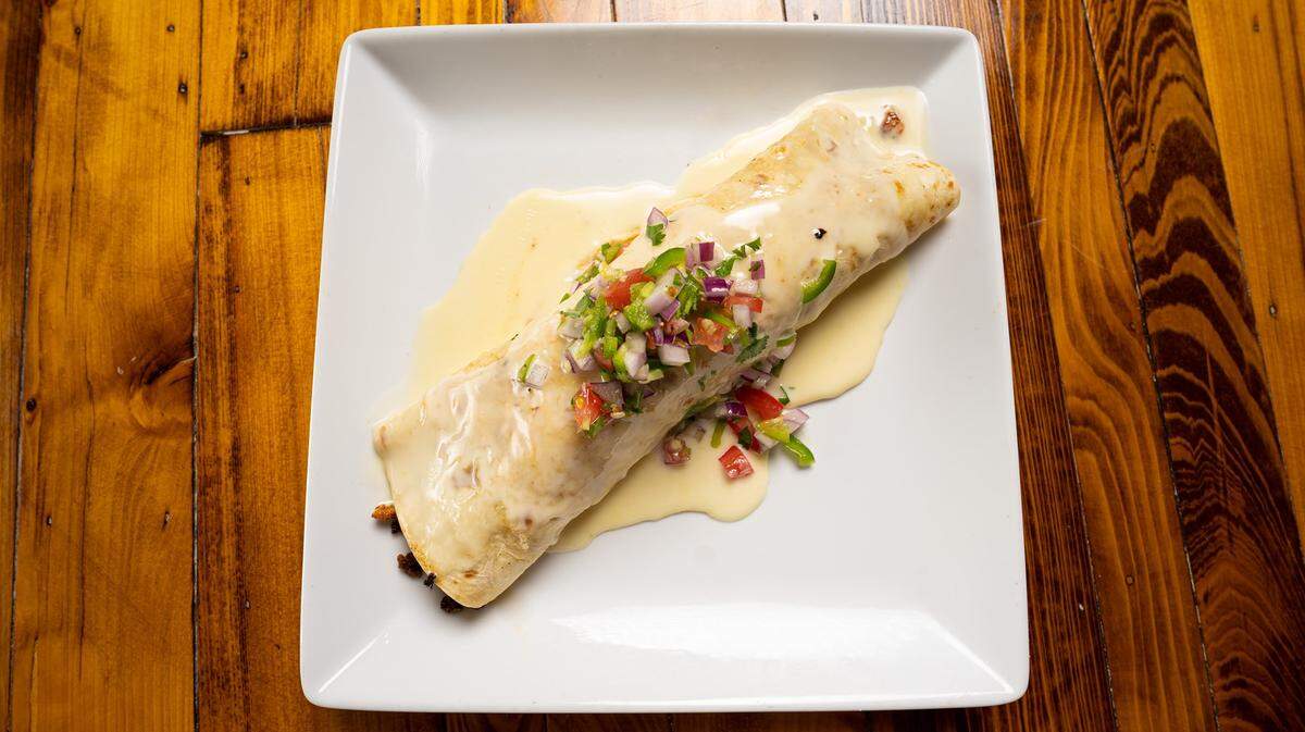 A Burrito Torreon from Blue Laguna on Hilton Head is stuffed with grilled chicken, rice, beans and homemade chorizo.