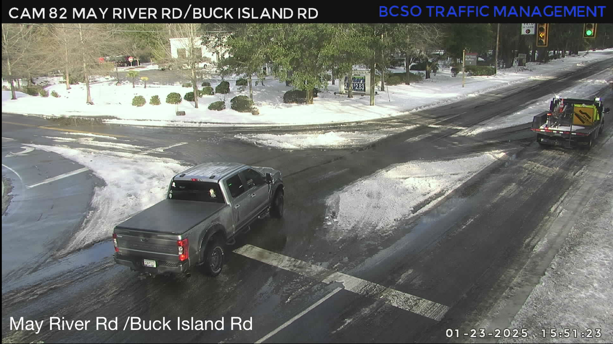 A utility vehicle for the South Carolina Department of Transportation was seen driving eastbound on May River Road, trailing two snow plows that helped clear out the slushy intersection around 3:50 p.m. Thursday.