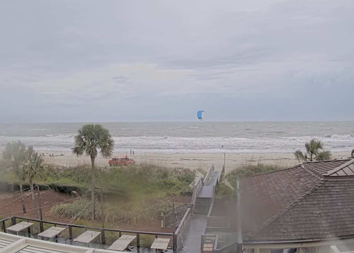 As their trucks flew red flags indicating a high risk of rip currents Thursday afternoon, Hilton Head Island lifeguards watched a kitesurfer glide across the water near the Sea Pines Beach Club. Forecasters anticipate heavy winds and rough surf in the Beaufort County area as Hurricane Helene chugs toward the Florida panhandle.