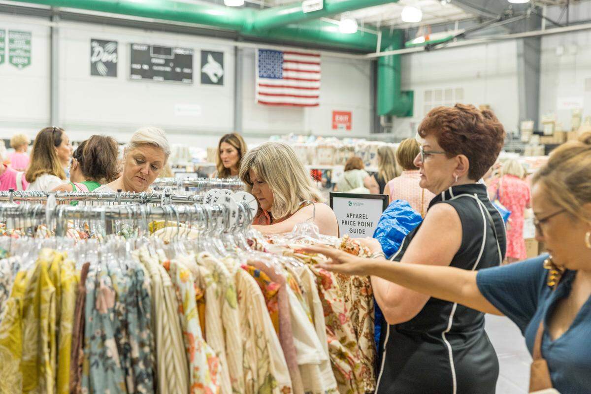 Shoppers at the 2025 warehouse sale in the Bluffton High School gym.
