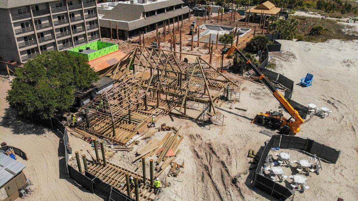 This drone photo shows the full remodel of the outdoor beach space at Beach House Hilton Head Island as seen on Tuesday, April 9, 2024, on Hilton Head. Starting at the bottom left and moving toward the top right shows: the stage for live music, the Tiki Hut, the swimming pool and The Dunes Pavilion, a beachfront&nbsp;event space.