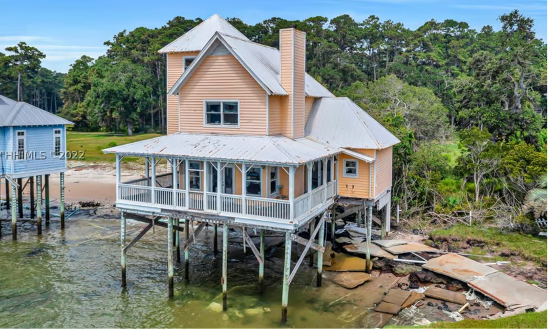 A view of the cottage from the water.