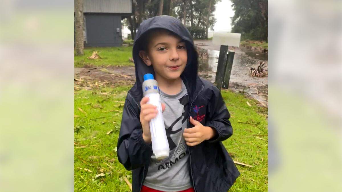 8-year-old Harrison McKenzie reports near Bluffton’s AllJoy Landing on Aug. 30, 2023 as Hurricane Idalia was coming closer to South Carolina after making landfall in Florida earlier that morning.