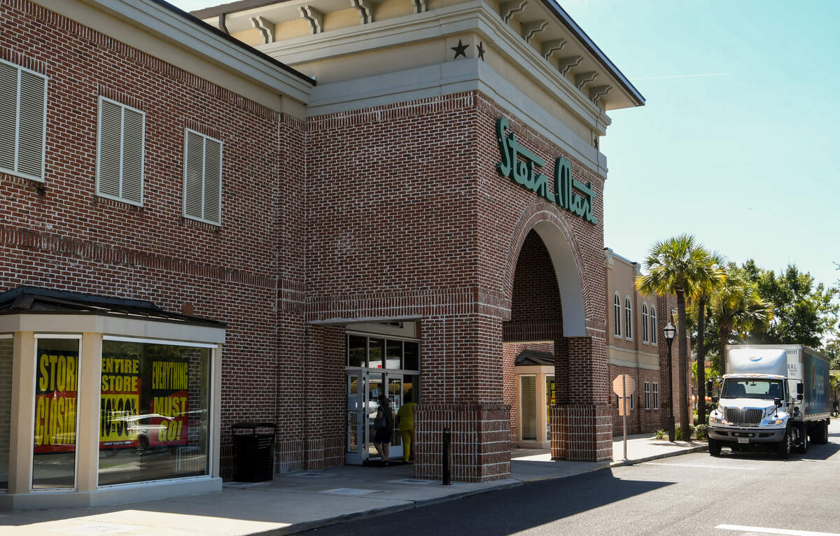 Signs announcing the closing of Bluffton’s Stein Mart are seen on Aug. 17, 2020, in the windows of the department store located in Belfair Towne Village. The discount department store chain — two of which are located in Beaufort County, S.C. — will be closing all of its stores after filing for Chapter 11 Bankruptcy protection.