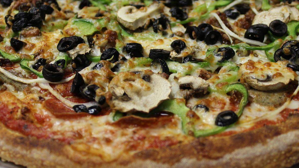 Dough Boys pizza has a soft crust and generous toppings.