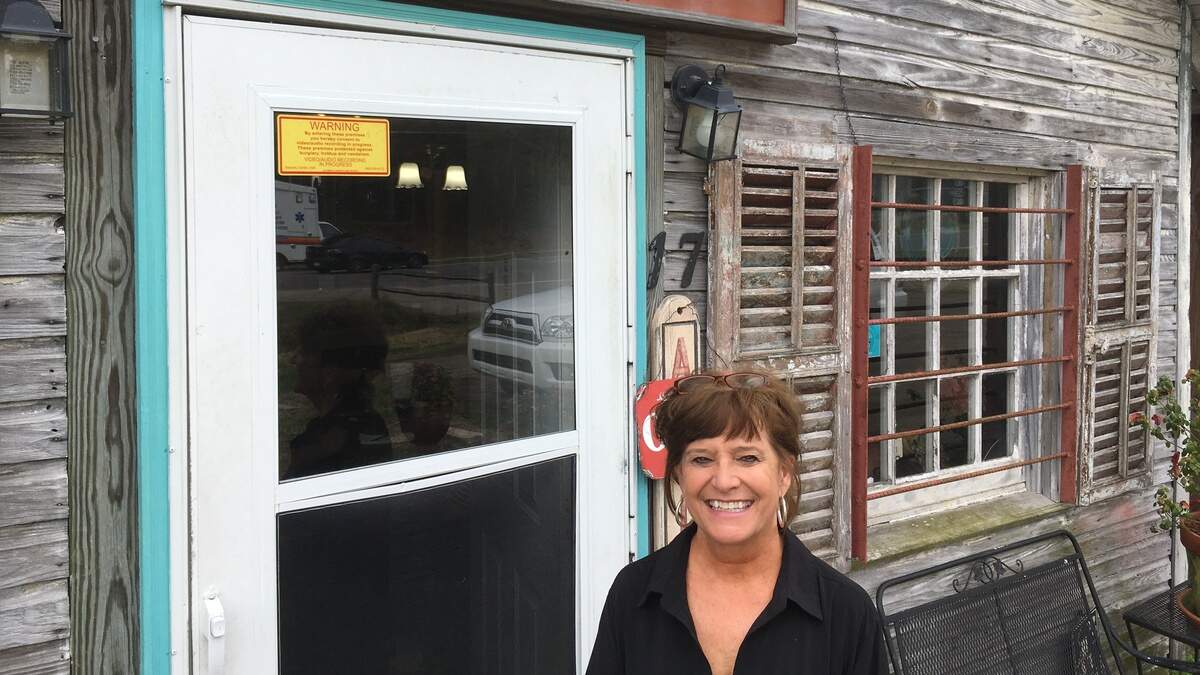 Paula Flowers, co-owner of Fletcher’s cafe in Yemassee, stands in front of her business Thursday. Flowers supports the town being annexed into Beaufort County and said it could help raise the town’s standing and connect the county to I-95.