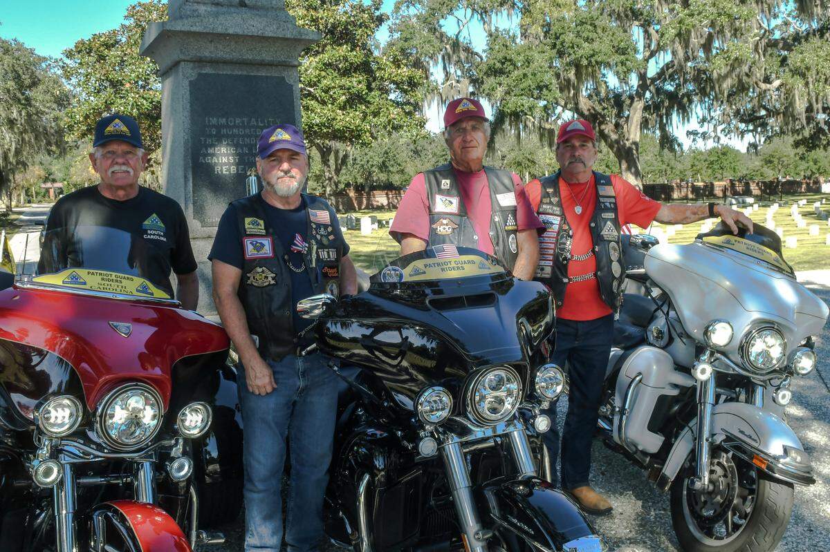 David Rickman, from left, Bob McCune, Ray Giuliano and Ray Richards pose for a photo on Monday, Oct. 30, 2023 at Beaufort National Cemetery. The men are all members of the Patriot Guard Riders.