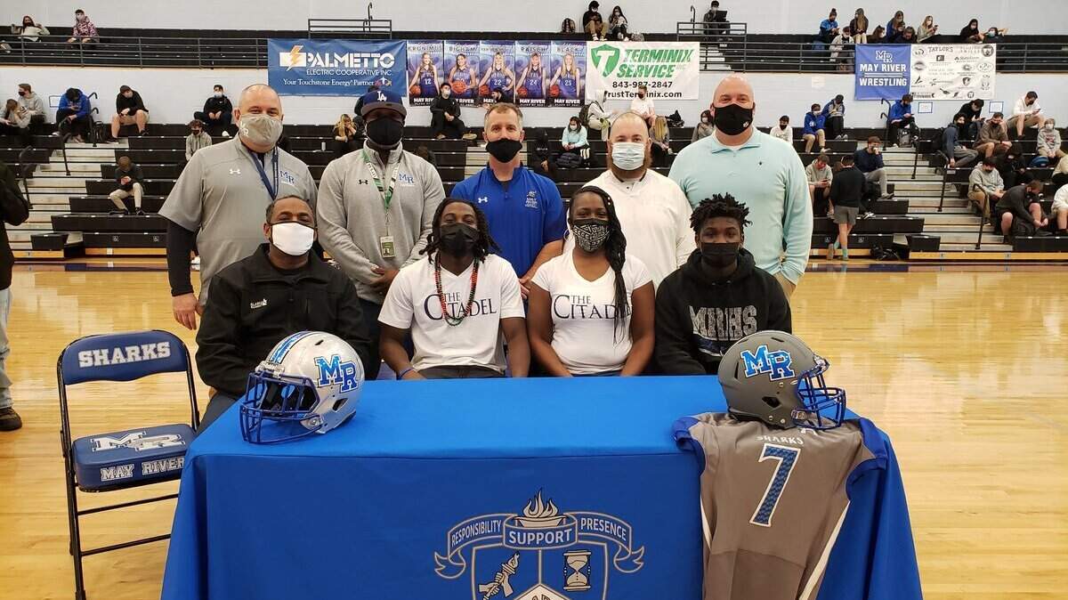 Mr. Football finalist and May River quarterback Ahmad Green signed to play football at The Citadel on Wednesday.
