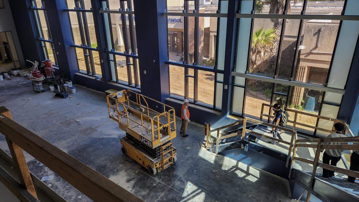 A view from the second floor of the Media Center at the new Hilton Head Island High School as photographed on March 26, 2026, on Hilton Head. The original high school, which will be demolished at the end of this school year, can be seen through the floor to ceiling windows.