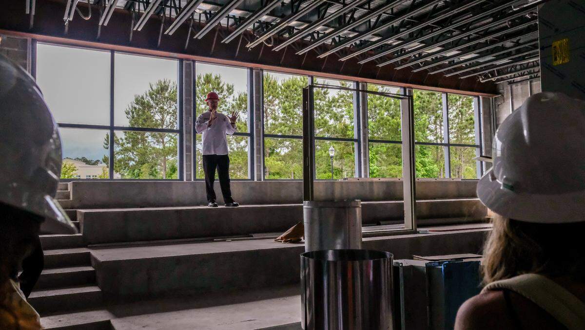 Chef Miles Huff, dean of The Culinary Institute of the South,&nbsp;leads a tour on Thursday, June 3, 2021, from the top step of the amphitheater in at Technical College of the Lowcountry where future “Iron Chef” competitions will take place. With a capacity of roughly 50 people, the space can host visiting chefs or conduct food and wind pairings with the available warming kitchen and a host of other events. “It’s going to be a super, super popular space.” Huff said with excitement. “A much needed space.”