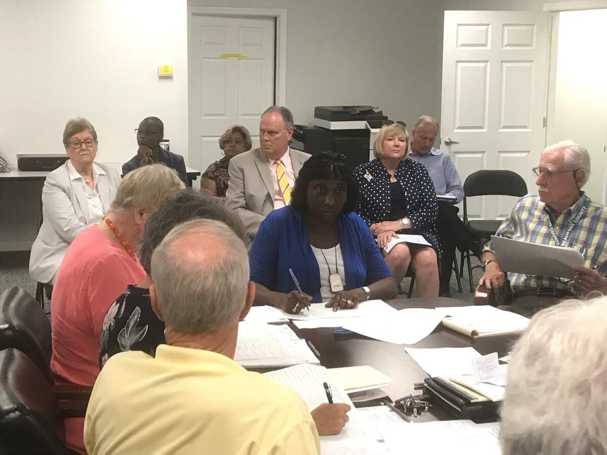 Beaufort County Board of Voter Registration and Elections Director Marie Smalls, center, looks on as board members discuss 2018 S.C. Primary contest results Thursday, June 14, 2018, in Beaufort, S.C.