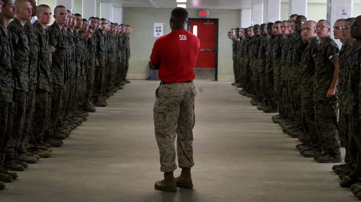 Senior Drill Instructor Kingsley Nwosu gives orders to his recruits on Oct. 6, 2015, in their barracks at Marine Corps Recruit Depot Parris Island.