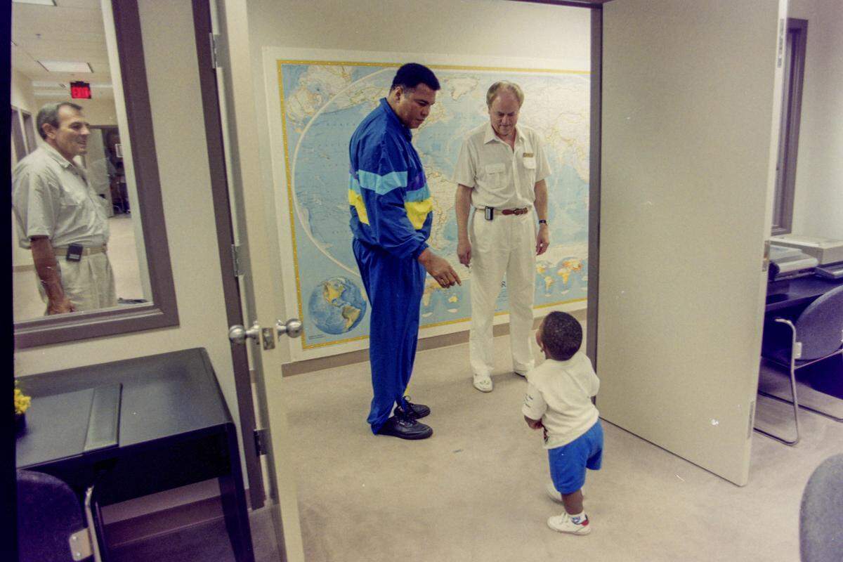 Muhammad Ali, center, is photographed with his son, Asaad, and his medical doctor, Rajko Medenica, right, on Sept. 22, 1992, at Hilton Head Hospital on Hilton Head Island.
