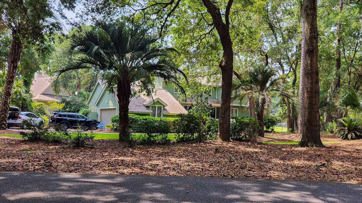This home on the corner of Swing About and High Water photographed on July 19, 2023 is listed on the real estate rental site VRBO and is located in the gated community of Palmetto Dunes on Hilton Head Island. The VRBO posting lists the six bedroom, five bathroom house as being able to sleep 30 and averages a cost of $540 per night.