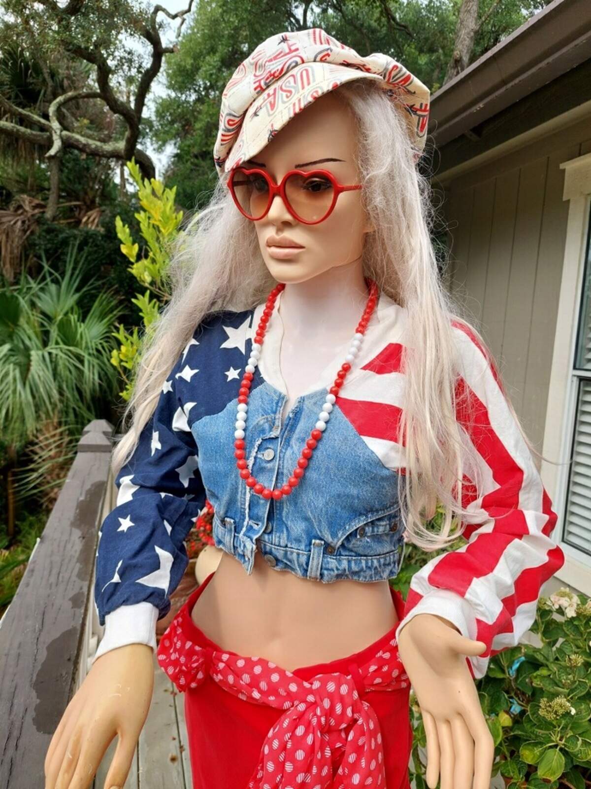 Virginia, a beloved neighborhood mannequin, has stood on the Conrad family’s front porch in various outfits since 1997, according to owner Phyllis Conrad