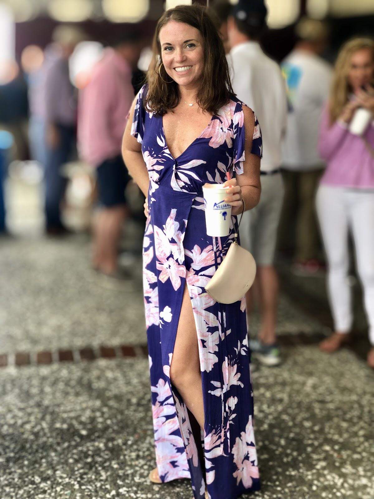 Underneath the covered patio at Quarterdeck, Caitlin Mcamulty of Columbia, SC wore a stunning blue and pink maxi from Lulu’s. Carla’s dress proves that even though maxi’s are usually floor length, they can be just as fun as shorter dresses. Caitlin’s maxi featured a slit to give her the option of dressing the dress up or down, depending on the occasion. She’s attended Heritage for the last 6 or 7 years and has a wonderful time each year.
