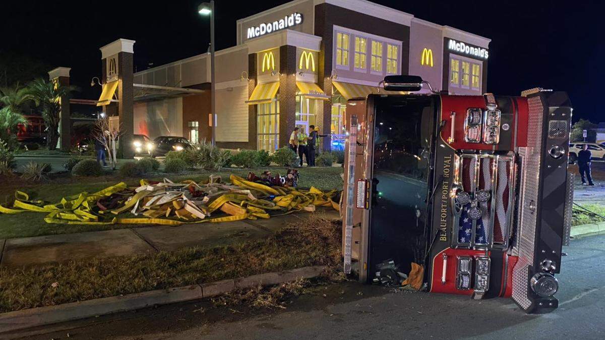 A City of Beaufort/Town of Port Royal Fire Department truck flips over on Thursday, Nov. 3, 2022, in Beaufort, South Carolina.