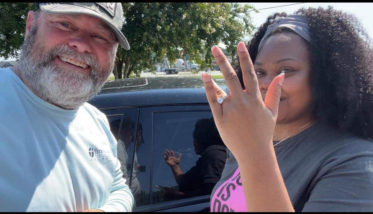 Local metal detector operator Moye Howard poses for a photo with Amber Davis after finding her lost wedding ring on Folly Field Beach in late June. Davis, a Hilton Head resident, connected with Howard through a community Facebook group. “I thought I would never see it again,” she wrote in a post online. “Thank you again, Moye! You are truly a blessing!”