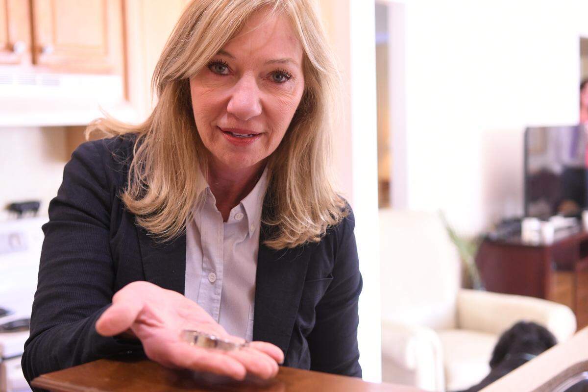 Susan (Weed) Neal holds the bracelet that her teenage boyfriend, David Krulewicz, exchanged with her for a Christmas present in 1979. On Jan. 5, 1980, the couple was parked at a lovers’ lane area in Burton when an unknown man killed David and raped Susan.
