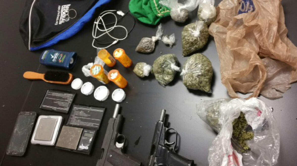 Some of the illegal drugs, weapons and other paraphernalia Bluffton Police officers say the found in a backpack thrown by Tyrique Daqwan Scott during a foot chase the afternoon of Nov. 16, 2015.
