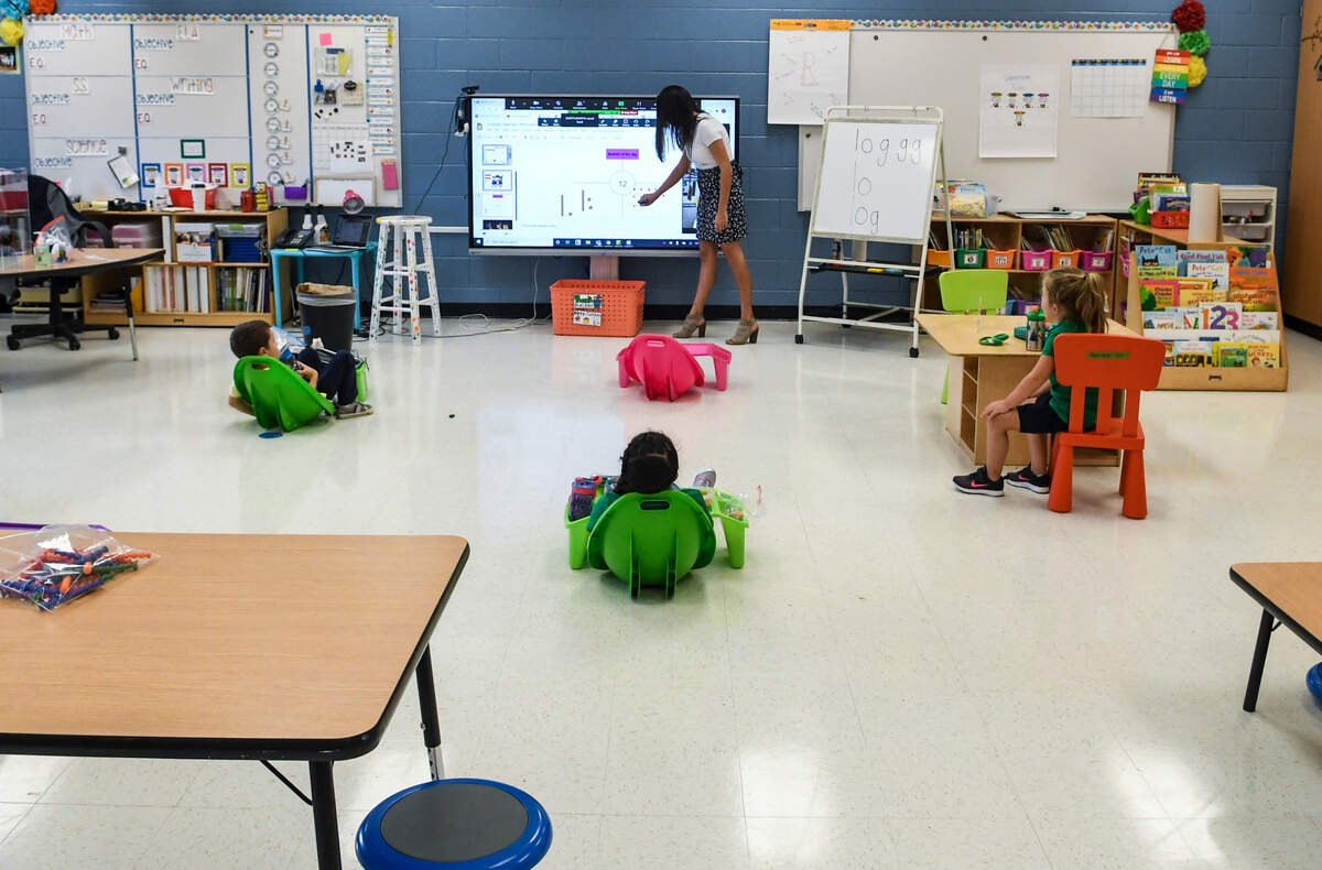 On the first day of hybrid back to school in-person teaching, kindergarten students at Pritchardville Elementary School enjoy a snack on Monday, Oct. 5, 2020 while learning about the days of the week and counting all done while maintaining space between each other.