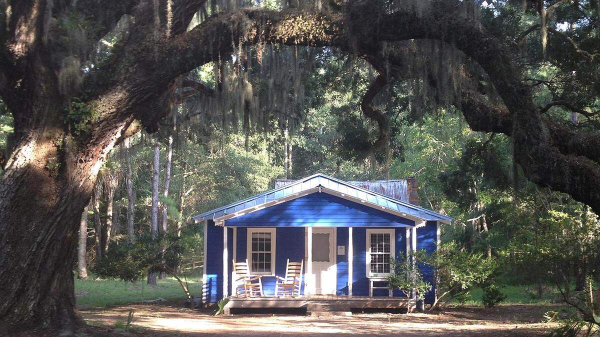 The Frances Jones House on Daufuskie Island had deteriorated to the point that it was almost beyond repair, as seen here. But in a new program by Palmetto Trust for Historic Preservation saved the home by leasing it from its owner and renovating it. The house is being rented out to recoup the program's renovation costs and set up a revolving fund to fix up more historic Gullah homes on the island.