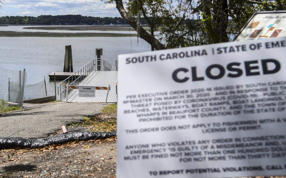 Several signs at Calhoun Street Dock inform those on arrival on Wednesday, April 1, 2020, of its closure due to S.C. Gov. Henry McMaster’s executive order to close public waterways, beaches as well as non-essential businesses in hopes of stemming the spread of the coronavirus.