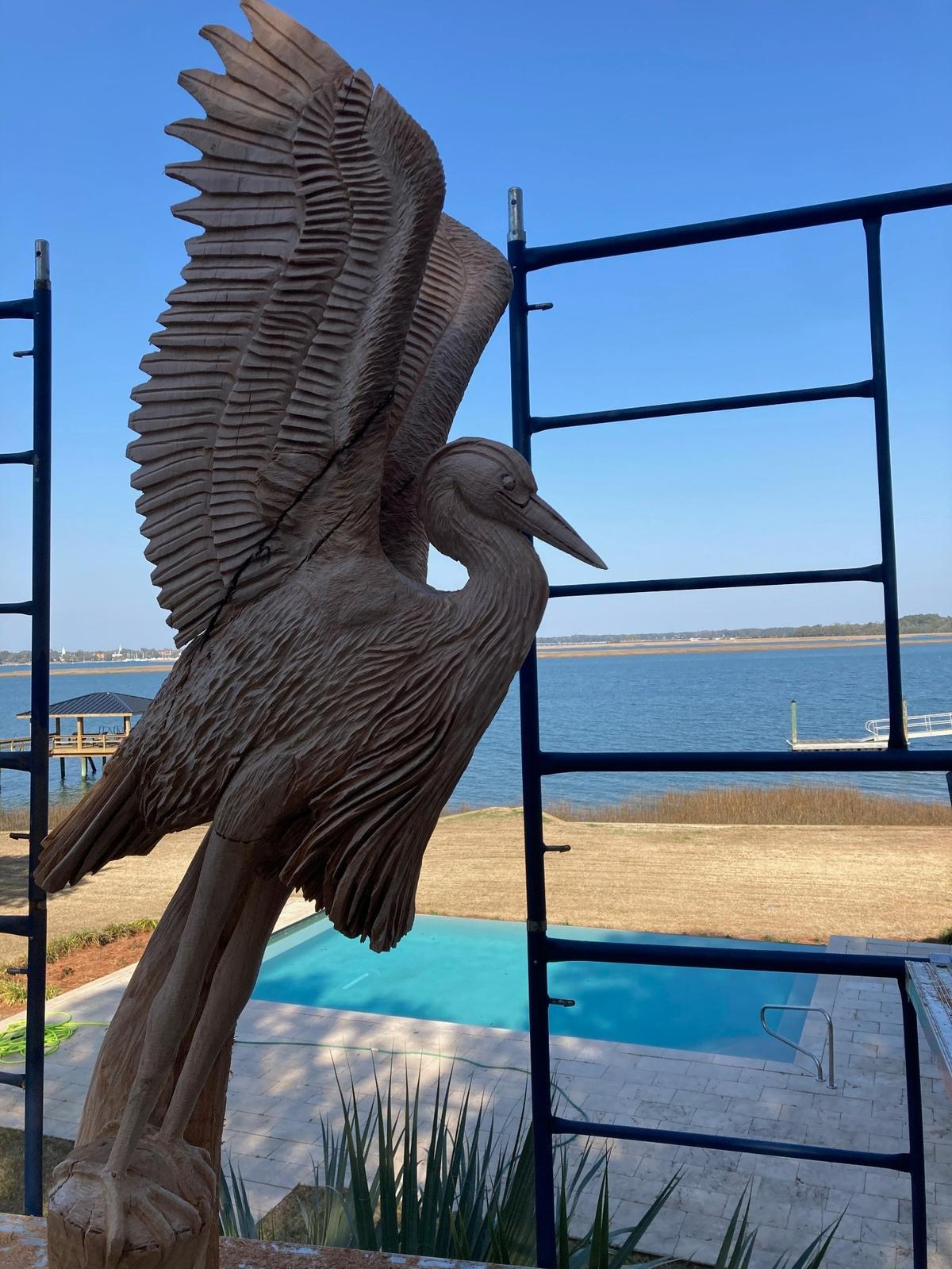 A 21-foot-tall sculpture featuring great blue herons is rising along the Beaufort River at the home Steve and Valerie Prochnow. The artist is Chris Lantz.