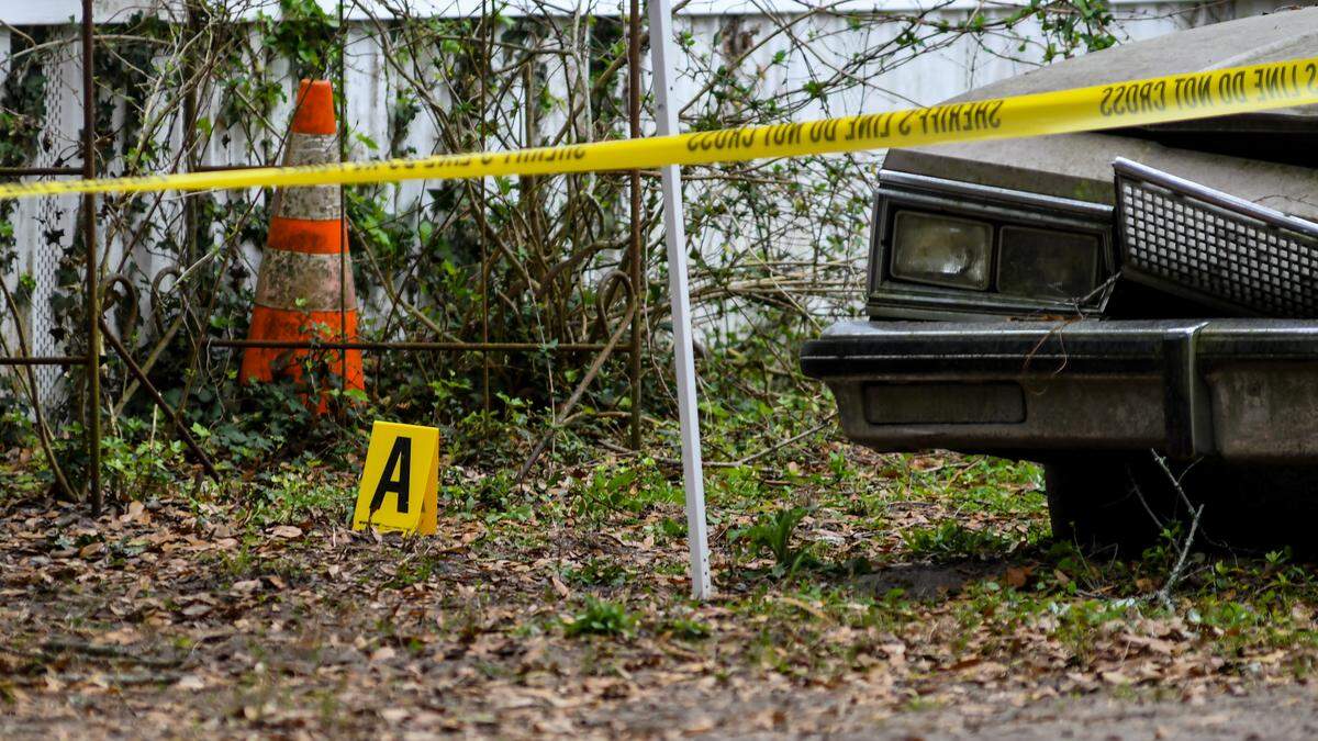 An evidence marker placed by investigators with the Beaufort County Sheriff’s Office Crime Scene Unit at a house at Baygall and Fish Haul roads on Friday, March 1, 2024 on Hilton Head Island.