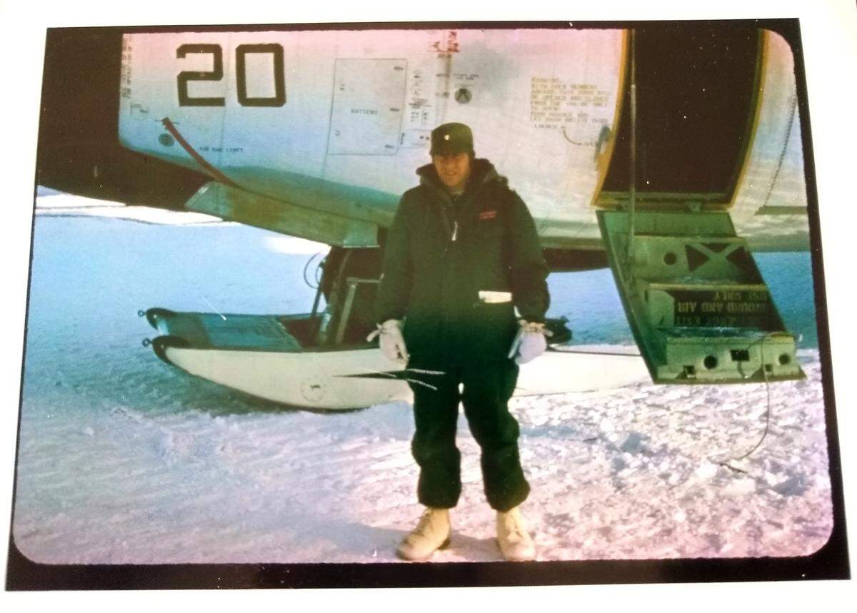 Then-Maj. Joseph R. Dobbratz Jr. is pictured next to an airplane he flew during research and exploratory missions to Antarctica that were part of Operation Deep Freeze supported by the Navy’s Air Development Squadron Six.