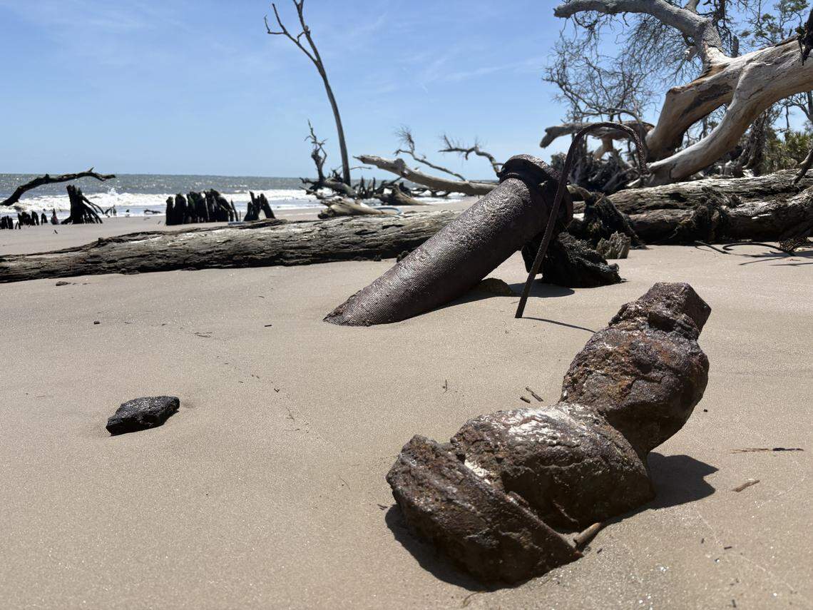 The remains of utilities and trees lay scattered across the beach on Daufuskie Island. As coastal erosion threatens homes along the stretch of beach, some homeowners have elected to move their homes further inland.