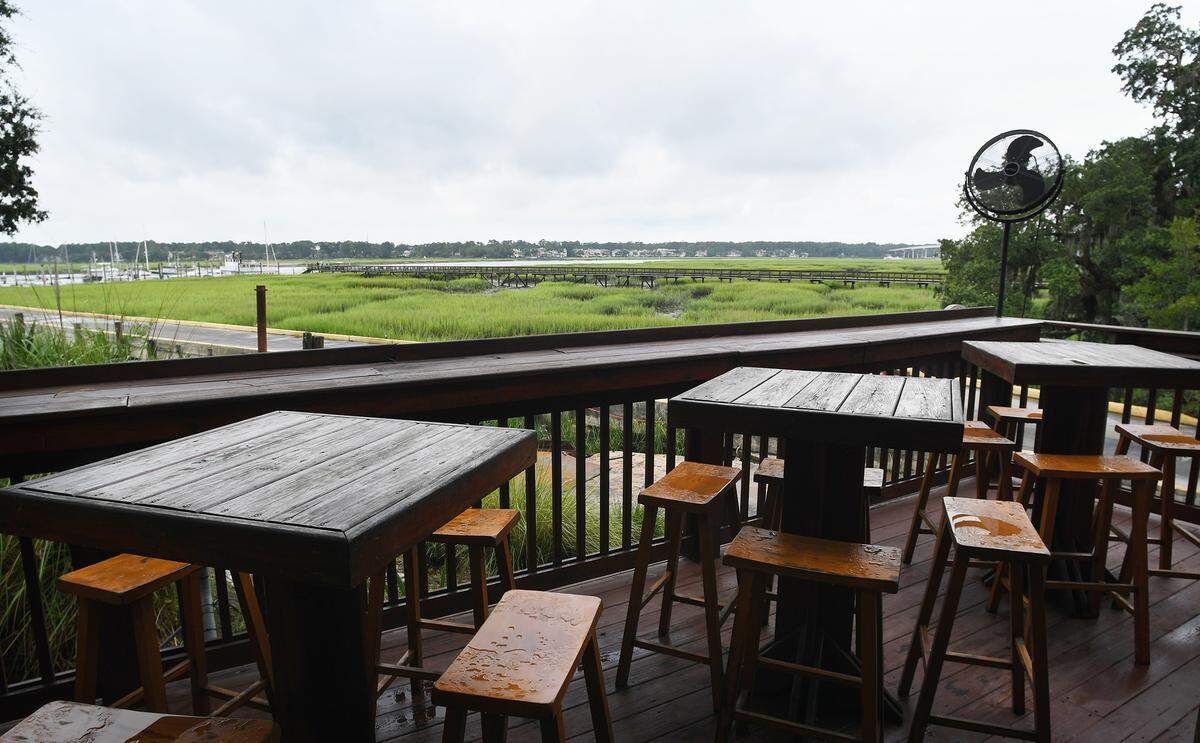 Up the Creek Pub offers a laid-back locals vibe and overlooks Broad Creek Marina and Broad Creek.