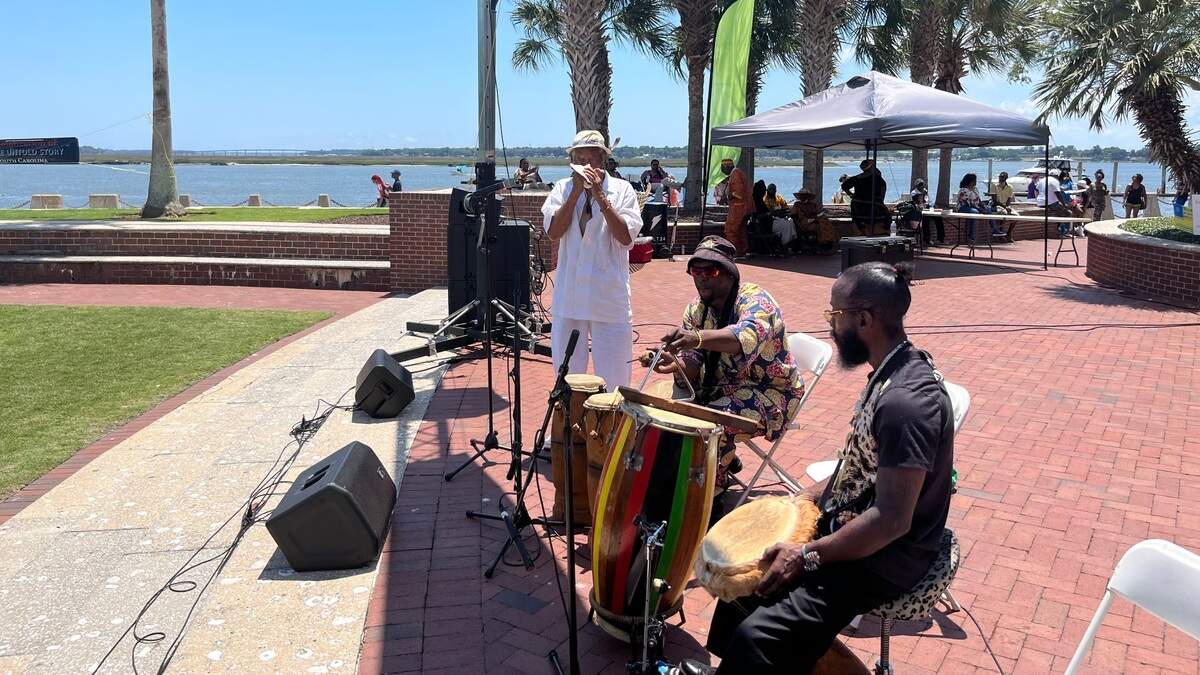 From left to right, Thomas Mosley of Columbia, Willie Bleach of St. Helena and Kevin Young of Estill perform the drum call Sunday at Waterfront Park in Beaufort during the Original Gullah Festival in 2022.