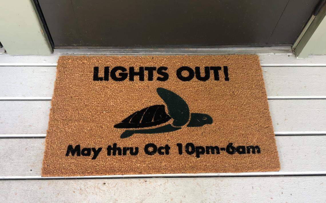 A door mat at Hilton Head Town Hall reminds people to turn their lights out during sea turtle nesting season May 1 through October 31.