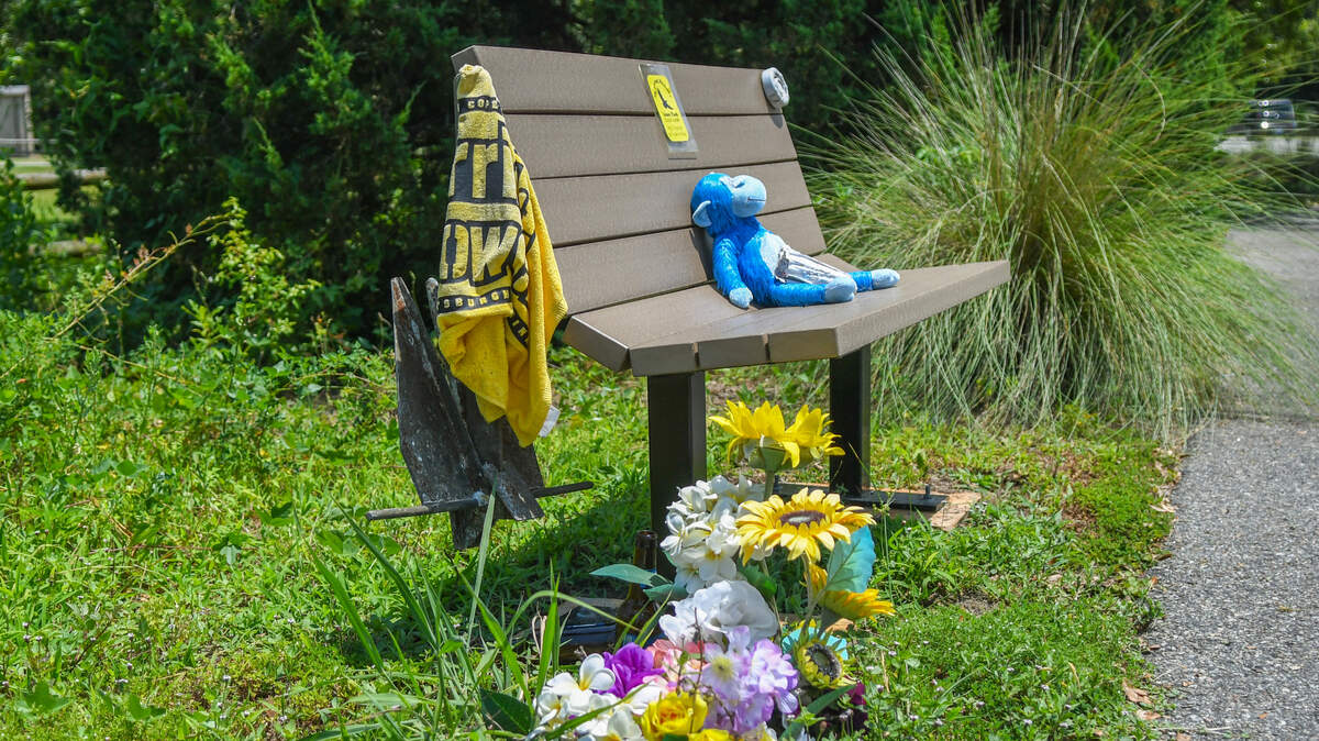 A park bench at the traffic circle at Squire Pope and Gumtree roads has now been adorned with a boat anchor in memory of Bluffton resident Jason Flack who was killed in a hit-and-run collision on February 25 on Hilton Head Island. Sylvia Nelanader, 61 of Hilton Head, was arrested by the South Carolina Highway Patrol as the accused driver of the vehicle. Besides the anchor, stuffed animals, colorful artificial flowers and a sign with text on the back of the bench gives Flack’s quote he was known for saying, “Hey, I’m glad you got to see me today.”