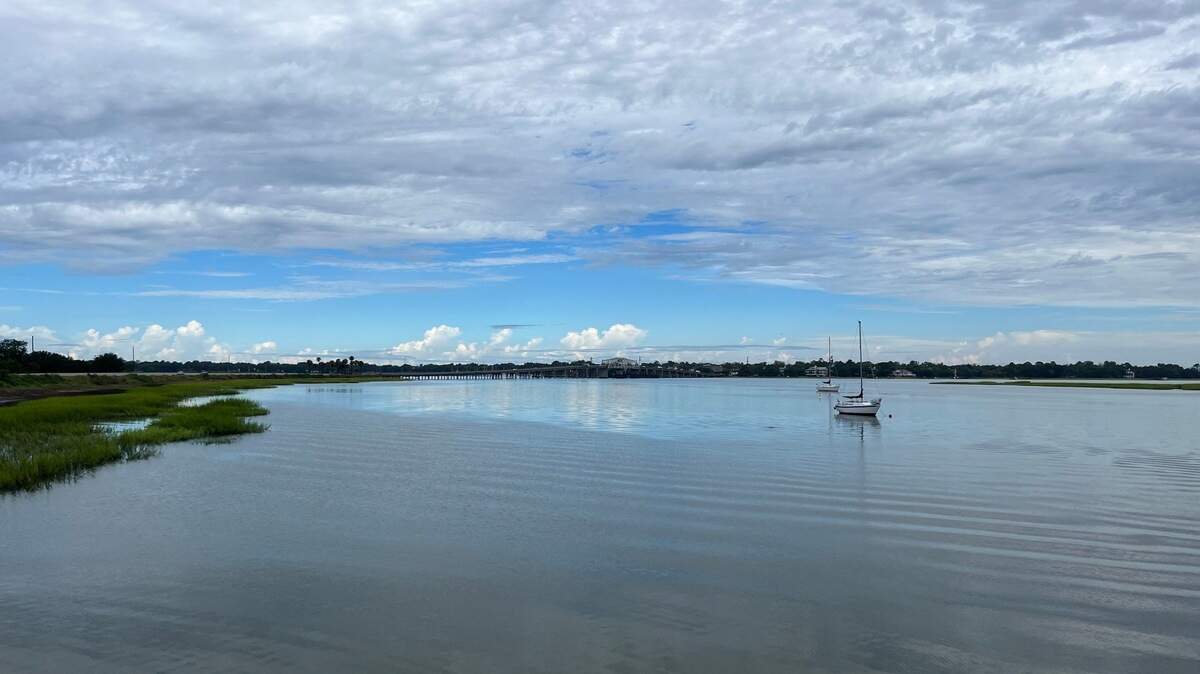 Calm before the storm at Whitehall Boat Landing on Lady’s Island looking toward Woods Memorial Bridge in Beaufort on Tuesday, Aug. 29, 2023.