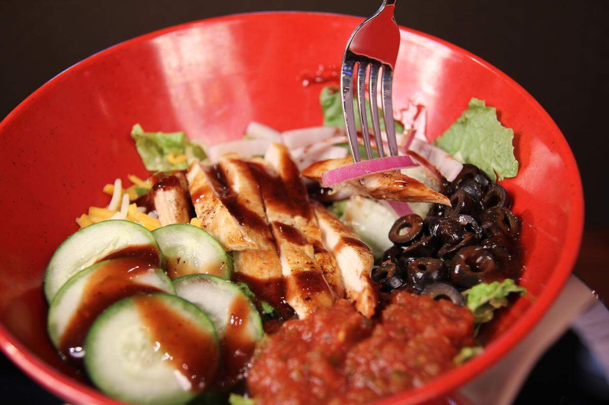 Customers can build their own salad from a list of ingredients or choose from among those already on the menu, such as the Southern Cobb Salad or the Barbecue Salad.