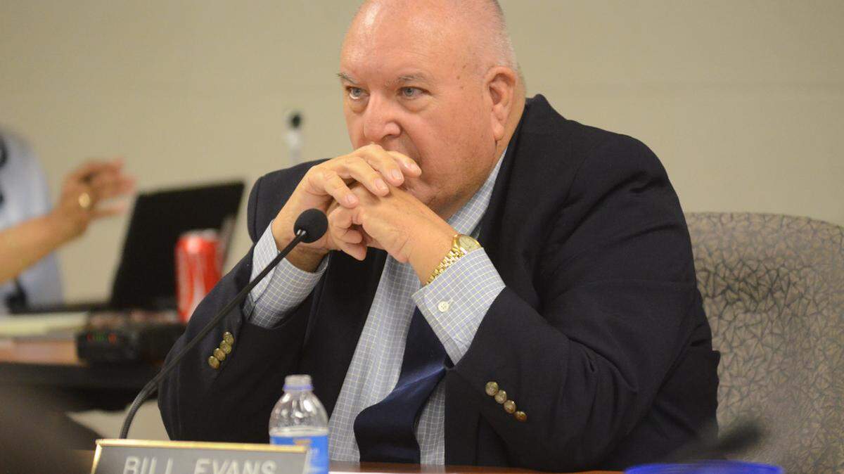 Beaufort County School Board chairman Bill Evans listens to the parade of speakers who stood up to criticize the board and district superintendent Jeff Moss during a special school board meeting Sept. 21, 2015, to discuss issues surrounding the hiring of Moss' wife, Darlene, to an administrative position with the district.