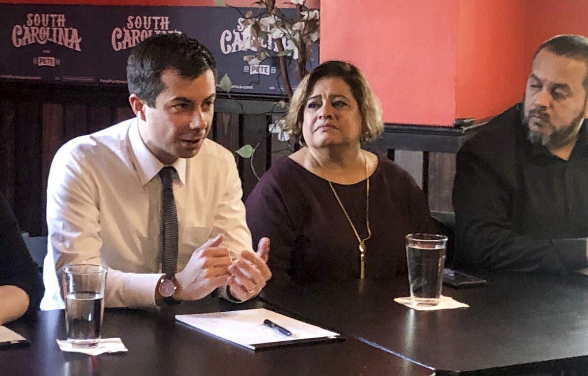 Democratic candidate Pete Buttigeig speaks to Latino voters at Las Palmas restaurant in Okatie on Dec. 3, 2019. He attended a roundtable and discussed racism, DACA and Hurricane Maria relief with Beaufort County Democratic Party chair Mayra Rivera-Vásquez (right).