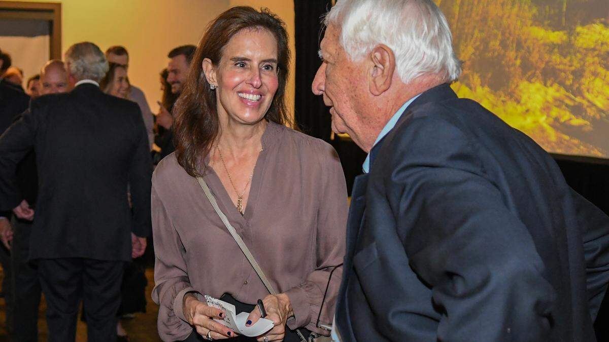Martha Rhodes, granddaughter of philanthropist Philip Rhodes who donated Pritchards Island to USC in the 1980s, speaks with an attendee after USCB’s “Return to Pritchards Island” presentation held at Tabby Place on Wednesday, Nov. 13, 2024 in Beaufort.