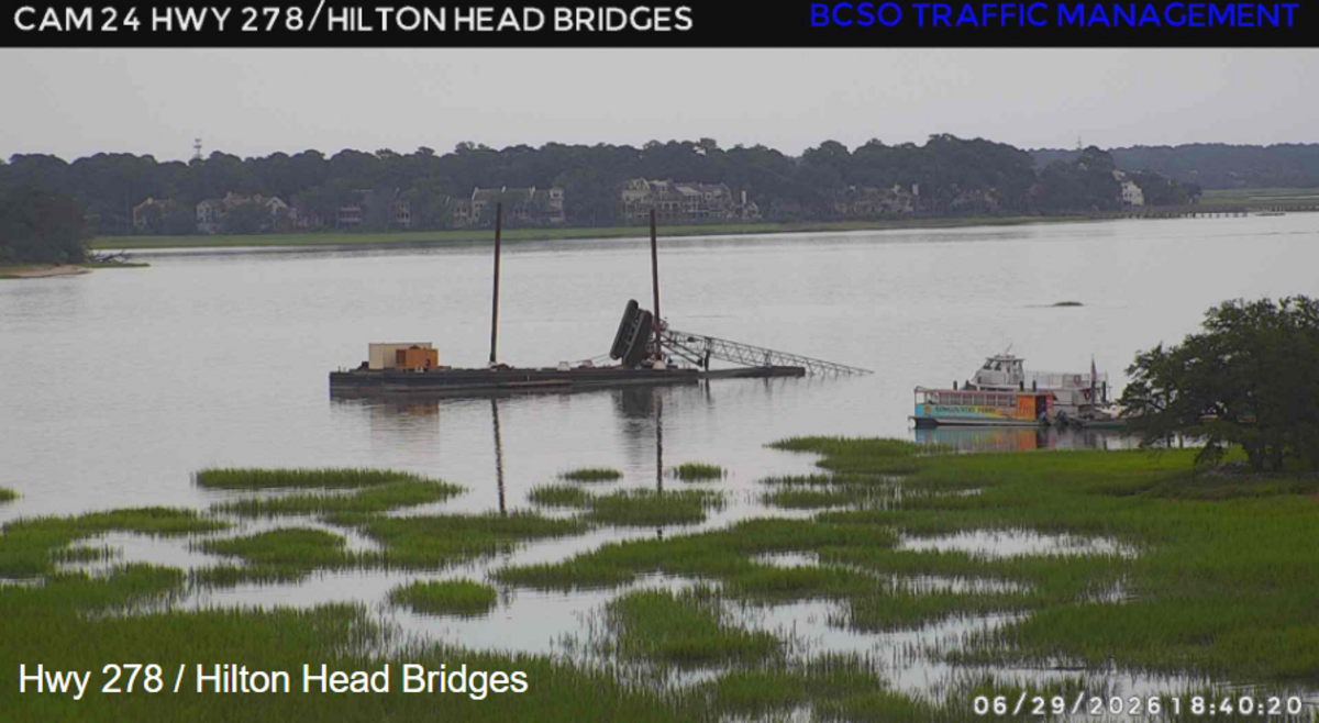 A crane on a barge off the coast of Hilton Head Island appeared to have tipped into the waters of the Mackay Creek in the early evening of June 29, 2026, prompting a response from the U.S. Coast Guard.