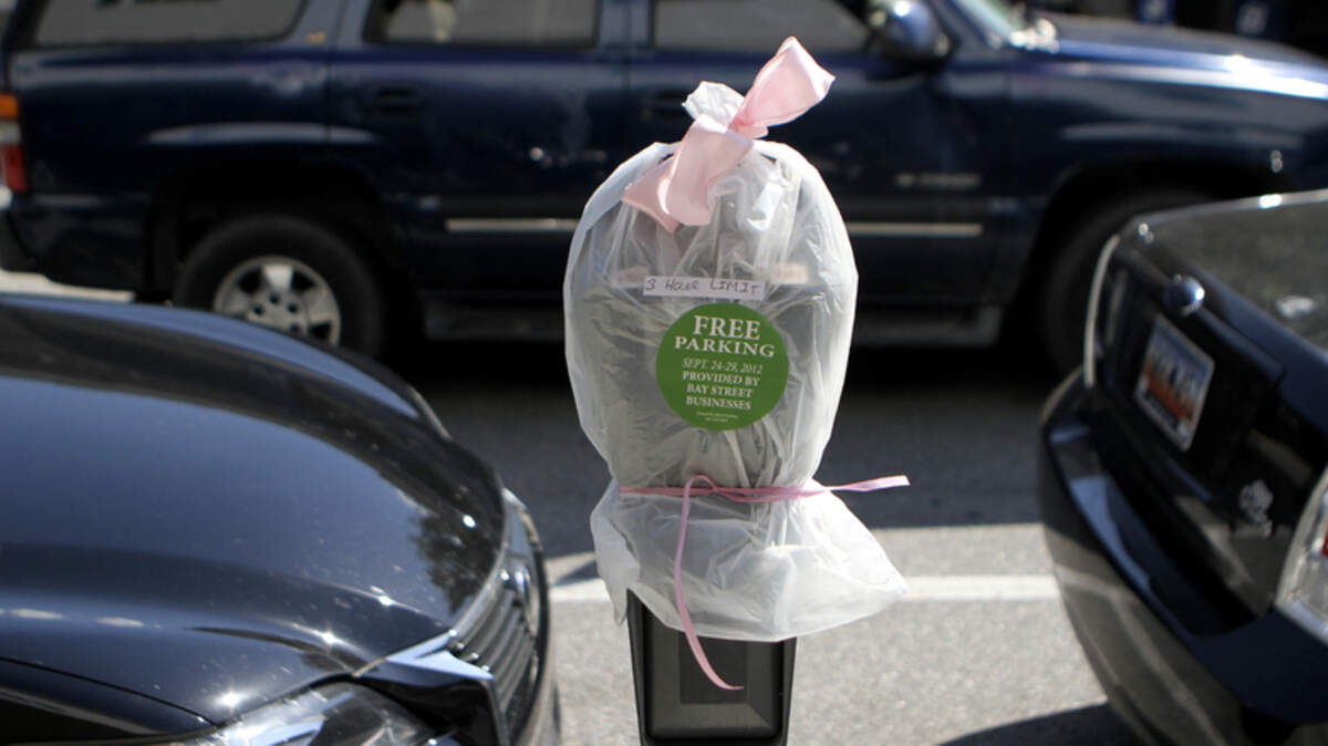 The parking meters on Bay Street in downtown Beaufort are labeled as part of a customer appreciation week in this September 2012 file photo.