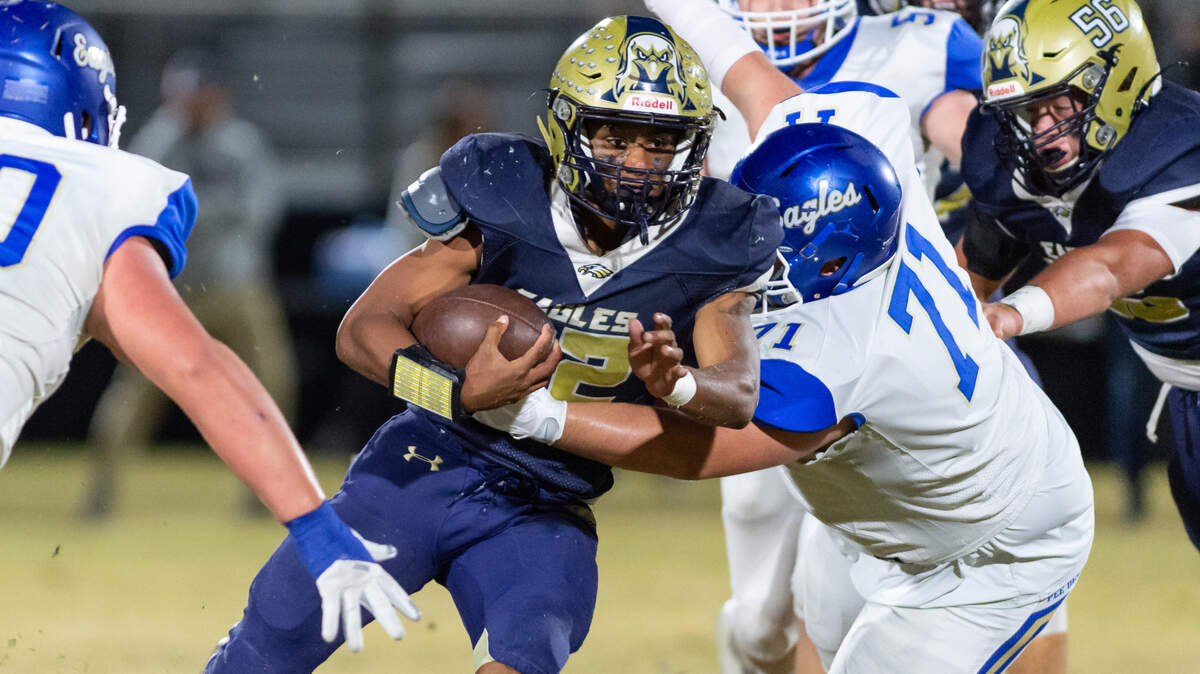 Hilton Head Christian Academy’s Joseph Robinson weaves through Pee Dee Academy’s defense as the Eagles walked away with a 52-23 victory on Friday, Nov. 12, 2021 in the semifinal round of the South Carolina Independent School Association Class 2A Playoffs in Bluffton.