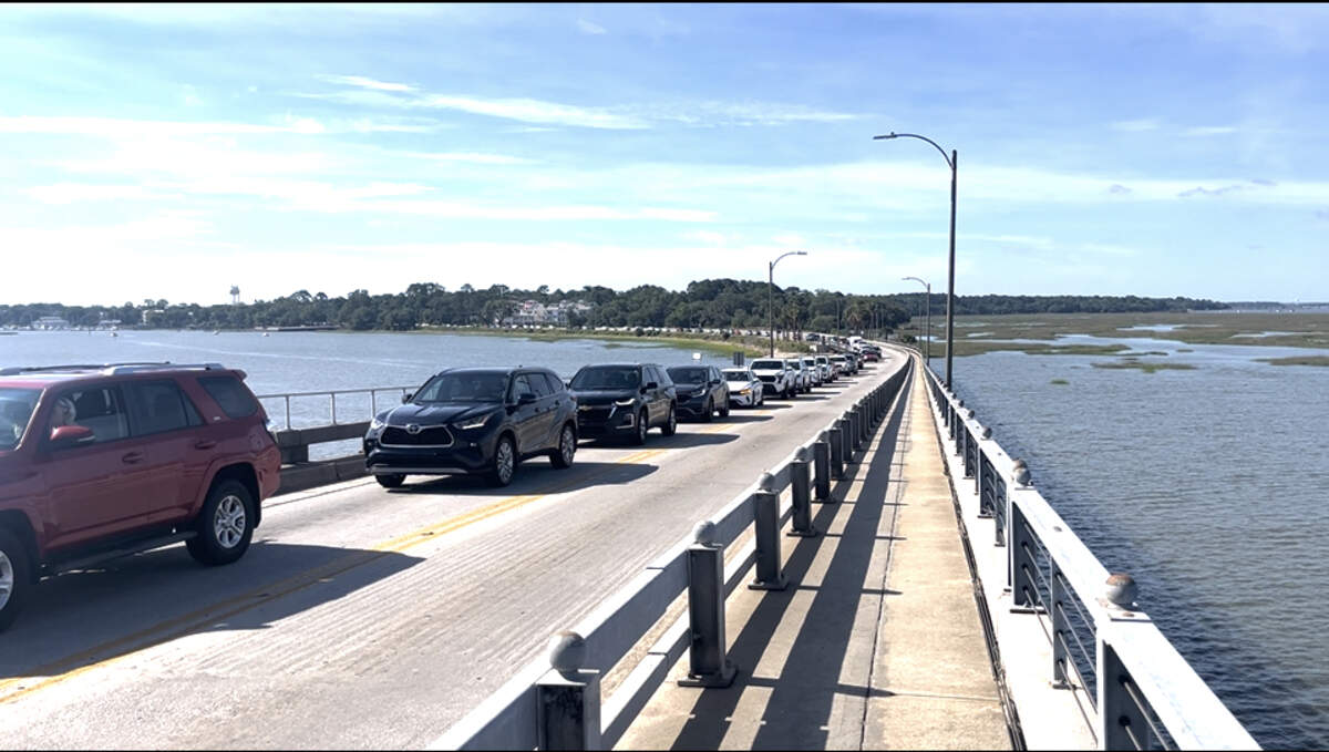Traffic waits while the Woods Memorial Bridge opens to allow for the passage of boats on the Beaufort River.