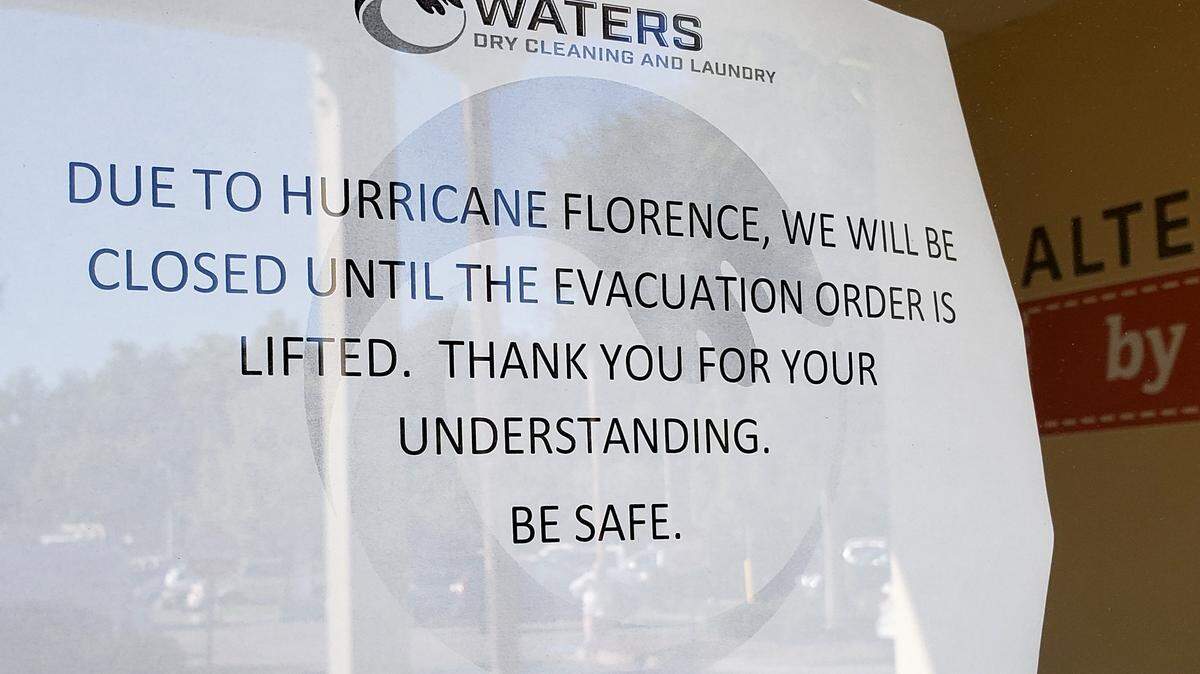 A sign at Bluffton’s Waters Dry Cleaning and Laundry informs customers of the store’s closure because SC Governor Henry McMaster called for a mandatory evacuation Monday afternoon because of Hurricane Florence’s projected path. On Tuesday, the governor reversed the mandatory evacuation for Beaufort, Jasper and Colleton counties as new predictions placed the hurricane on a North Carolina landfall.