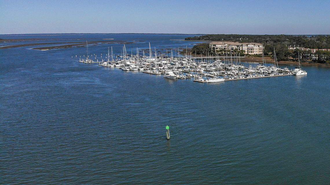 Safe Harbor Skull Creek Marina can be seen in this drone photo taken on Feb. 24, 2024, on Skull Creek that flows between Pinckney and Hilton Head islands – part of the Atlantic Intracoastal Waterway. On the evening of June 27, 2025, officers with the South Carolina Department of Natural Resources responded to report of a capsized vessel north of the marina. A preliminary report by the agency believes the vessel hit a navigational day marker guide, similar to the one pictured south of the marina.