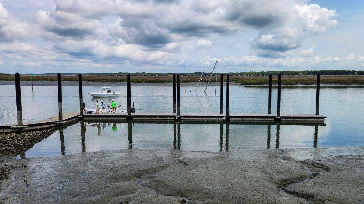 Masts from a sunken sailboat can be seen protruding from Factory Creek on April 23, 2025, directly across from the Whitehall Boat Landing on Ladys Island.