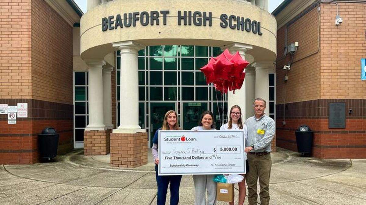 From left to right: English O’Kelley, mother, Virginia O’Kelley, senior and scholarship winner, Caroline O’Kelley, sister and sophomore at BHS, and Arthur O’Kelley, dad, pose with the award check on Oct. 29, 2025.