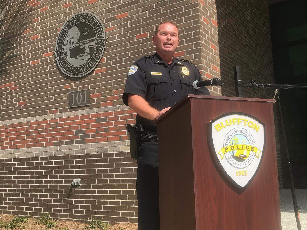 New Bluffton Police Department Chief Christopher Chapmond delivers a prepared statement at a news conference Thursday, Sept. 6, 2018, in Bluffton, S.C.