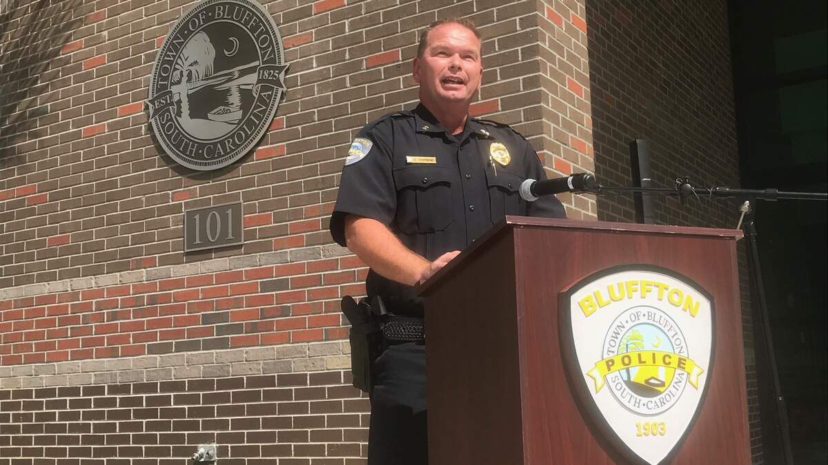 New Bluffton Police Department Chief Christopher Chapmond delivers a prepared statement at a news conference Thursday, Sept. 6, 2018, in Bluffton, S.C.